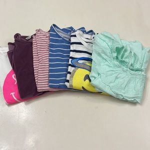 A lot of six girls shirts